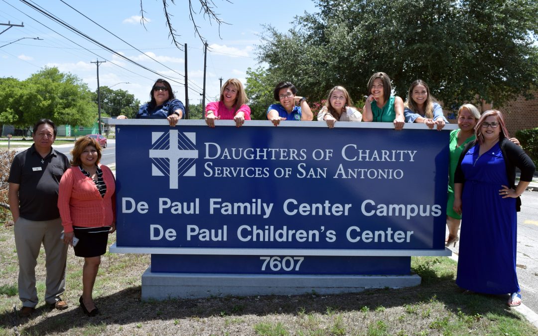 health navigators in front of sign